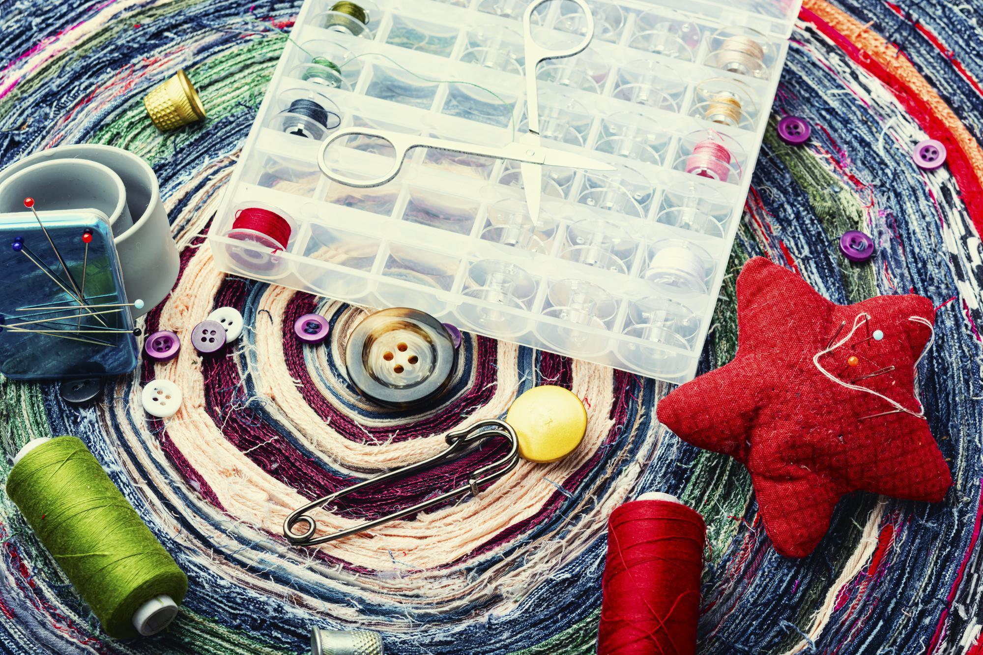 Compact collage of course modules and embroidery tools